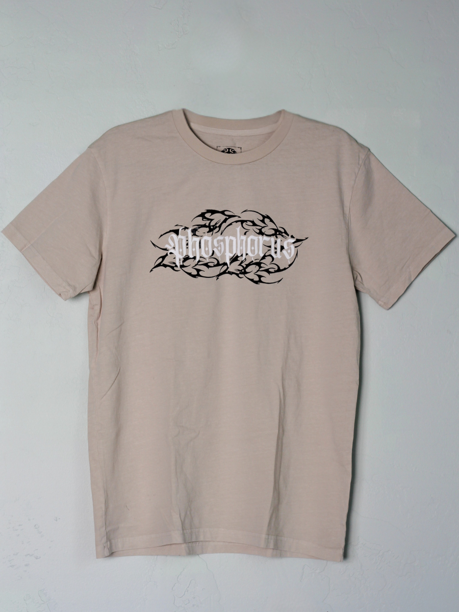 Bone shirt with 'Ember Tee' logo on a black tribal background.